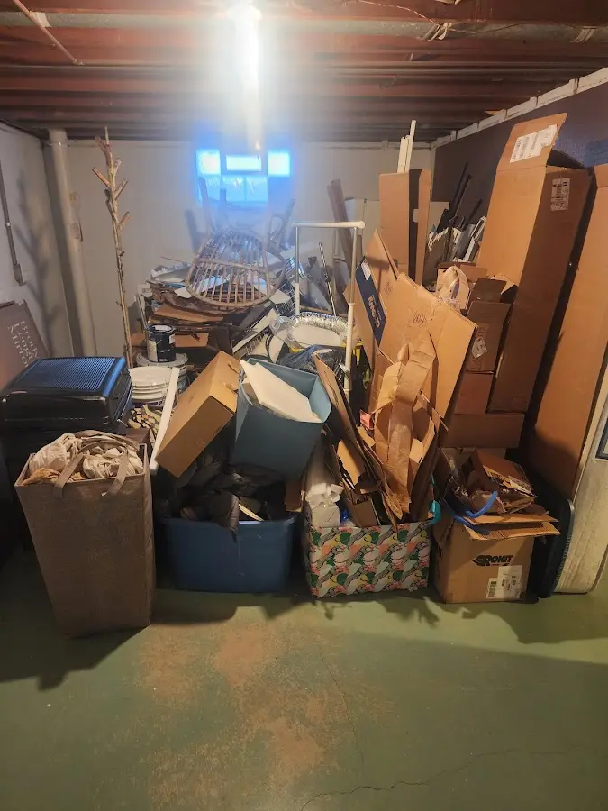 Roll-off dumpster container at job site for Yard Waste Dumpster Rental in Wyckoff